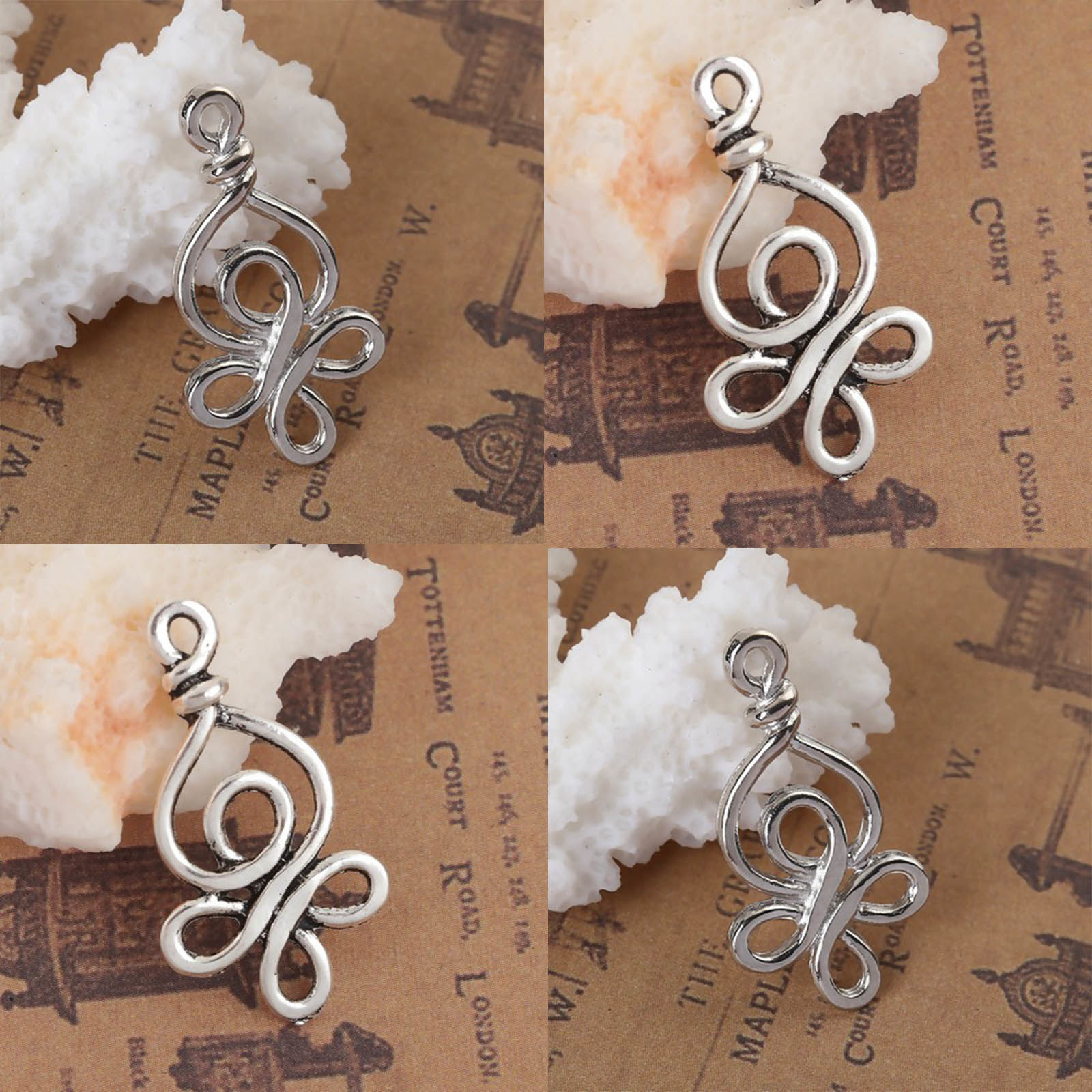 Picture of Zinc Based Alloy Charms Celtic Knot Silver Tone Hollow 28mm(1 1/8") x 15mm( 5/8"), 20 PCs