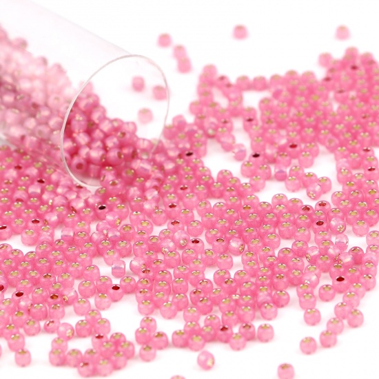 Bild von Glas Creme Samenperlen Zylinder dunkelrosa ca. 2 mm Durchmesser, Loch: ca. 0,6 mm, 1 Flasche