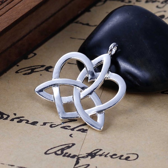 Picture of Zinc Based Alloy Pendants Heart Silver Plated Celtic Knot Carved Hollow 3.4cm(1 3/8") x 2.9cm(1/8"), 10 PCs