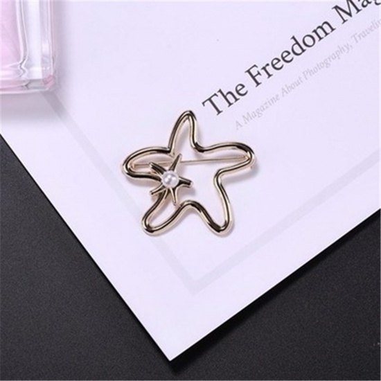 Immagine di Spilla Stella di Mare Oro Placcato Bianco Imitata Perla 1 Pz